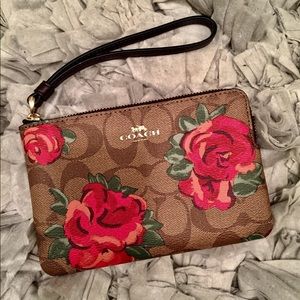 Coach floral wristlet.